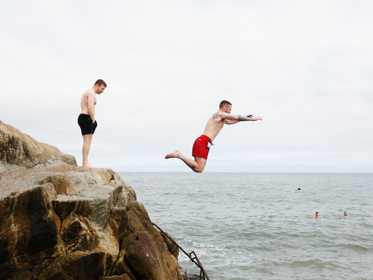 Swimmers at the Forty Foot at Sandycove, Dublin. Photograph: Leon Farrell / RollingNews.ie
