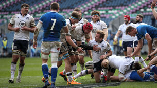 <p>Scotland's Scott Steele (right) celebrates scoring their sixth try of the match with teammates during the Guinness Six Nations match. Picture: Jane Barlow</p>