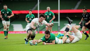 <p>Ireland’s Jack Conan gets in for a try despite the efforts of England’s Luke Cowan-Dickie and Tom Curry. 	Picture: James Crombie/Inpho</p>