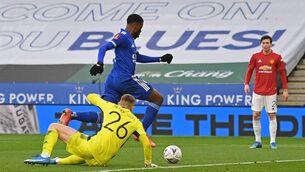 <p>Leicester City 'striker Kelechi Iheanacho takes the ball around Manchester United goalkeeper Dean Henderson before scoring the opening goal of the FA Cup quarter-final. Picture: Getty Images </p>