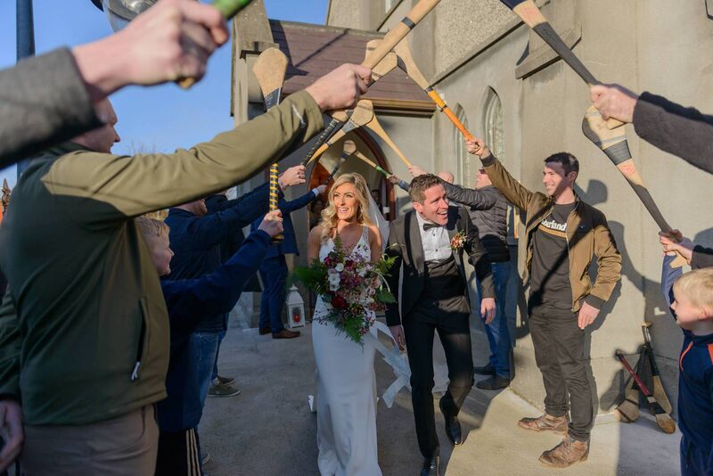 Jackie O’Carroll and Jerry Crean get a guard of honour (following social distancing protocol) during their December wedding