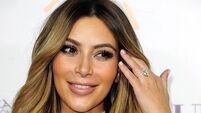 Kim shows off engagement ring at Beverly Hills gala