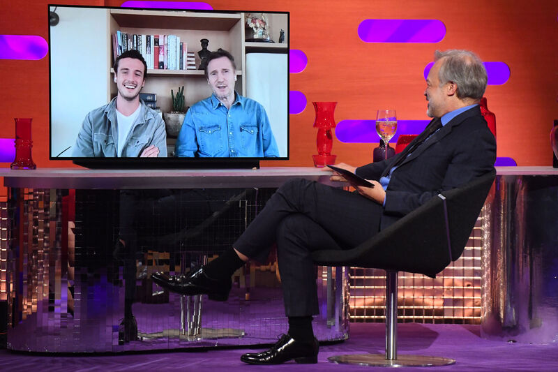 Micheál Richardson (left on TV screen) and Liam Neeson are interviewed remotely by host Graham Norton. Picture: PA Media on behalf of So TV