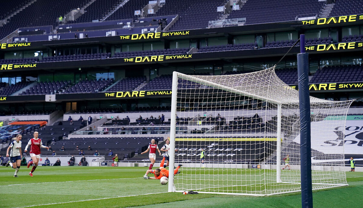 Arsenal's Katie McCabe scores their third goal of the match during the FA Women's Super League match at the Tottenham Hotspur Stadium 