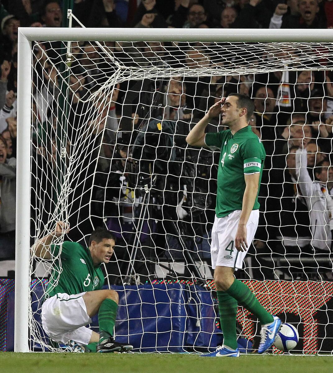 Republic of Ireland's John O'Shea (right) and Darren O'Dea react after conceding a fourth goal during the 2014 FIFA World Cup qualifying match at the Aviva Stadium. Picture: Niall Carson/PA Wire