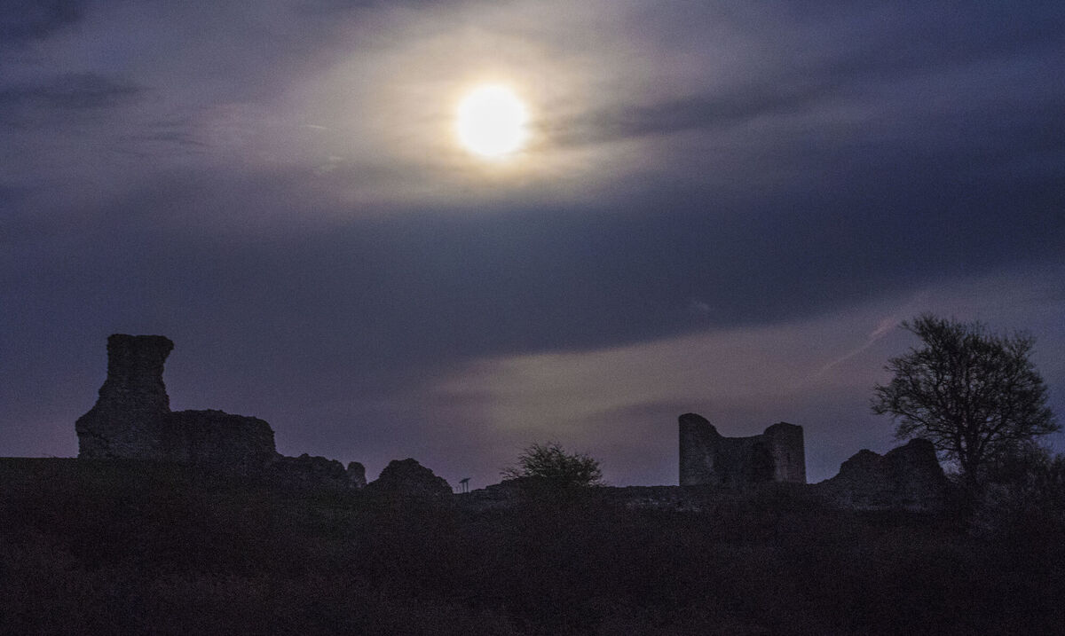A full moon, known as the Worm Moon is seen above Hadleigh Castle in Essex. Picture date: Sunday March 28, 2021. PA Photo. Photo credit should read: Ian West/PA Wire