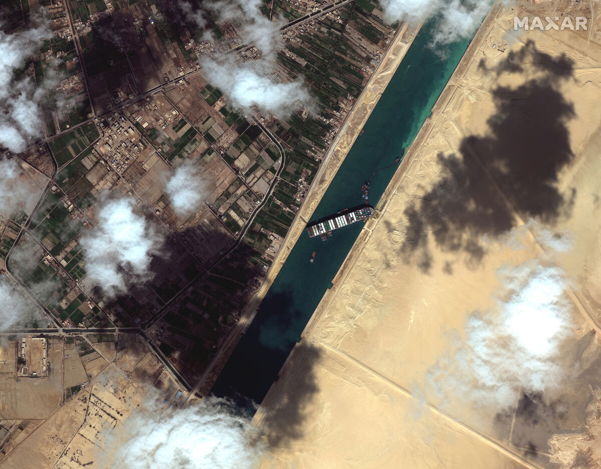 This satellite image from Maxar Technologies shows the cargo ship MV Ever Given stuck in the Suez Canal. Picture: Maxar Technologies via AP This satellite image from Maxar Technologies shows the cargo ship MV Ever Given stuck in the Suez Canal. Picture: Maxar Technologies via AP