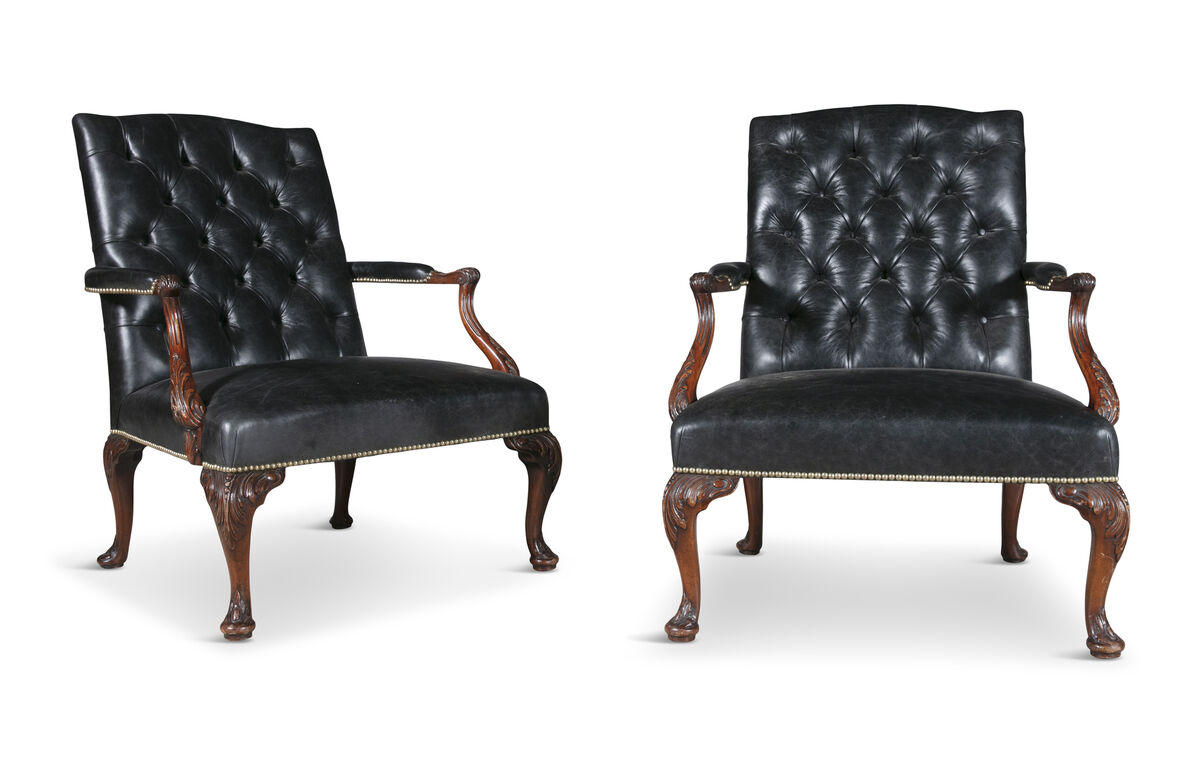 A pair of George III upholstered armchairs at James Adam.