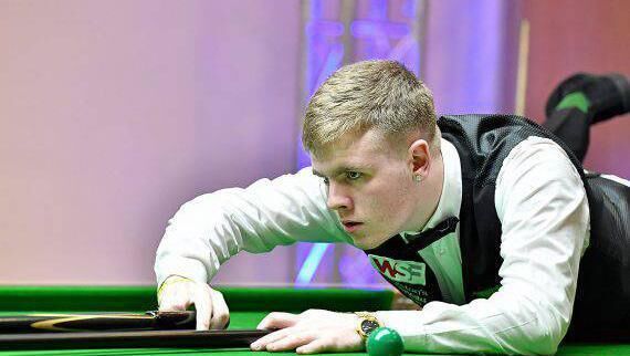 Cork professional Aaron Hill played in his first Triple Crown event in the UK Championship against Norway's Kurt Maflin