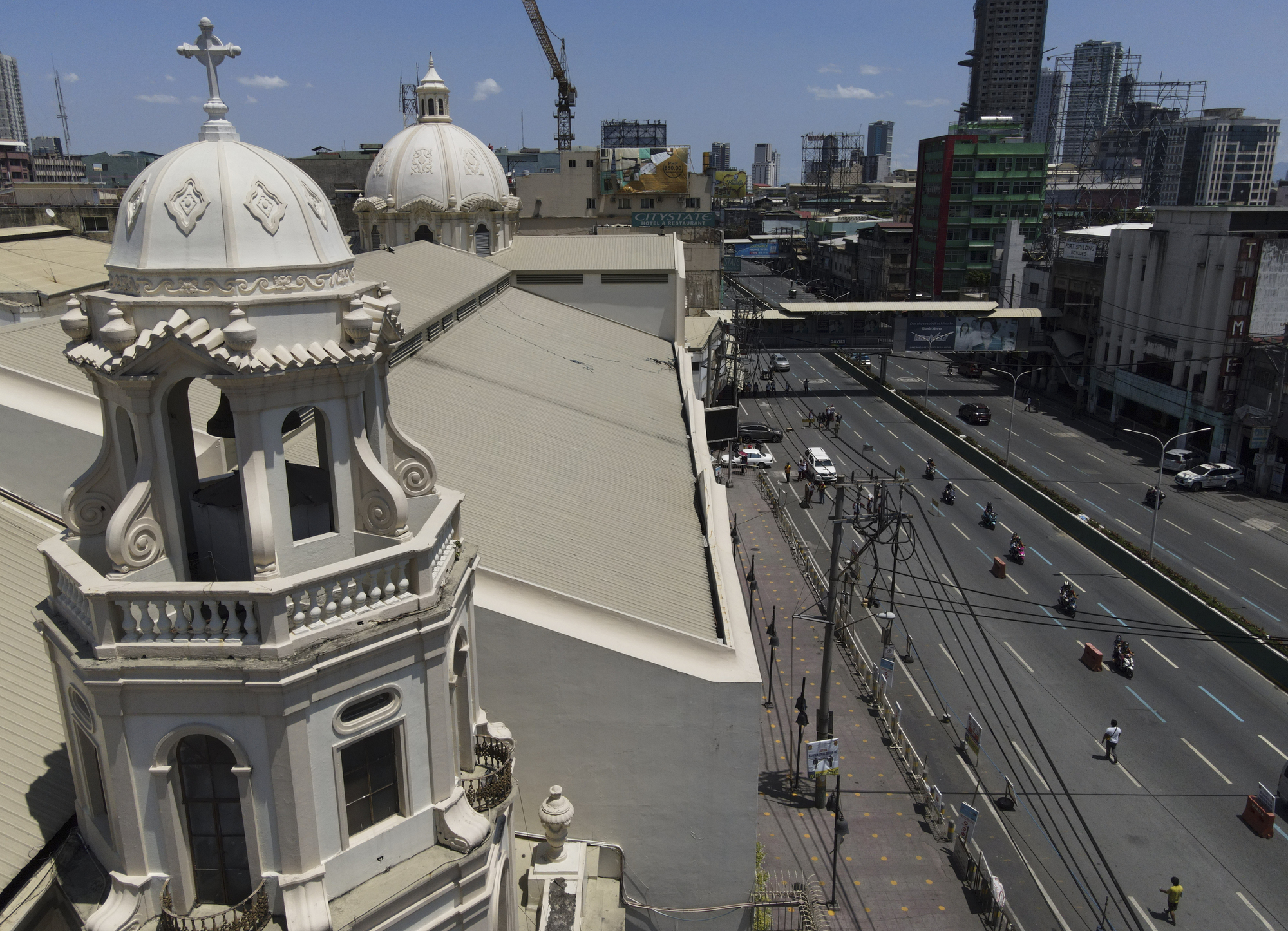 In Pictures: Christians mark Good Friday amid lingering virus woes