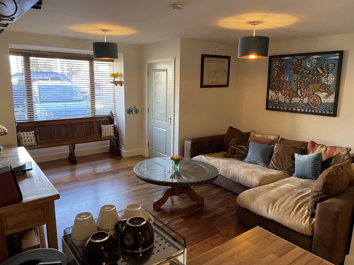 The tastefully decorated apartment has an attractively laid out patio garden.