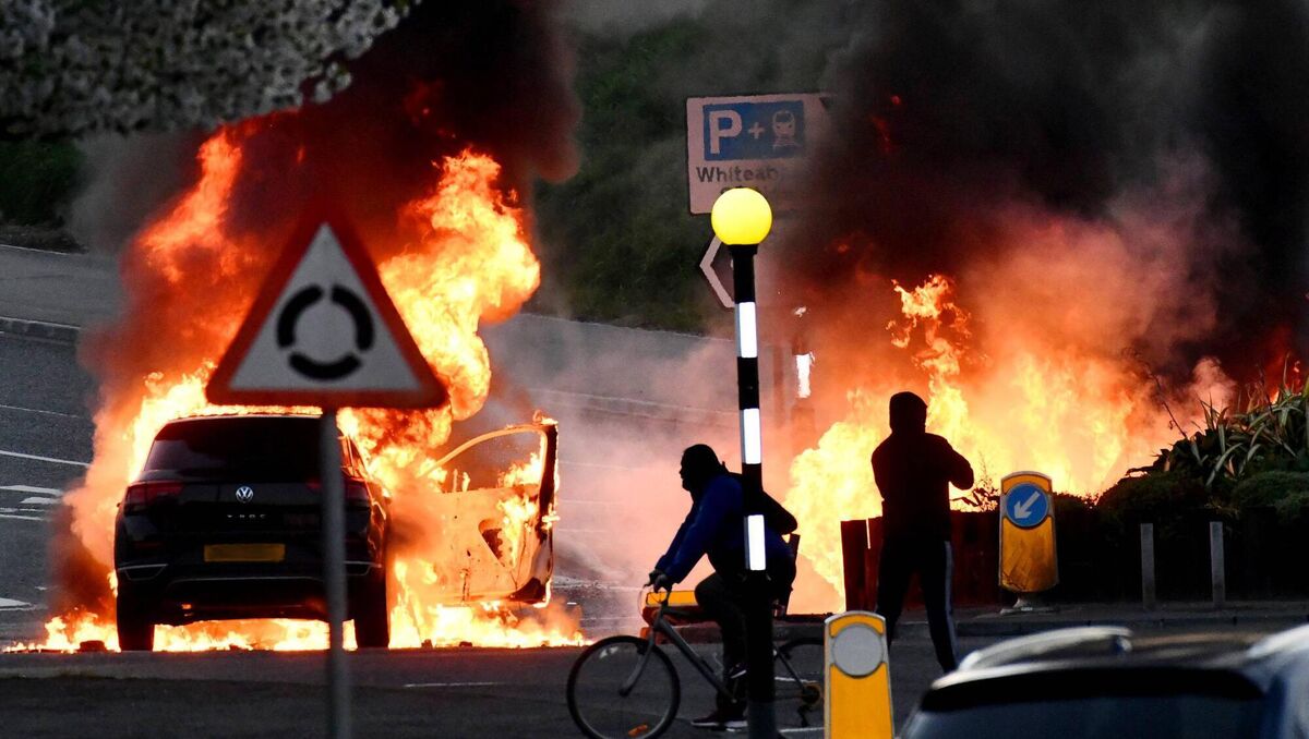 Cars set on fire during an outbreak of violence in Newtownabbey on Saturday night. Picture: Alan Lewis/Photopress Cars set on fire during an outbreak of violence in Newtownabbey on Saturday night. Picture: Alan Lewis/Photopress
