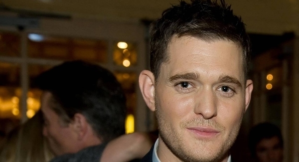 Buble: Bieber 'just a kid' who handles life 'with dignity'