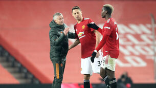 <p>Ole Gunnar Solskjaer says the red stadium wrap at Old Trafford has been problematic (Martin Rickett/PA)</p>