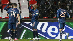 <p>TOP GUNS: Alexandre Lacazette, second right, celebrates with his team-mates after scoring Arsenal’s fourth goal against Slavia Prague in the Europa League quarter-final second-leg tie in Prague. 	Picture: AP Photo/Petr David Josek</p>