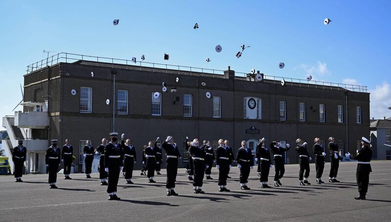 Members of Recruit Class Deirdre celebrate in the traditional way after their passing out parade at the Irish Naval Service base at Haulbowline, Co Cork. Members of Recruit Class Deirdre celebrate in the traditional way after their passing out parade at the Irish Naval Service base at Haulbowline, Co Cork.