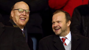 <p>Manchester United's owner Joel Glazer (left) and outgoing executive vice Chairman and Director Ed Woodward during the Barclays Premier League match at Old Trafford, Manchester.</p>