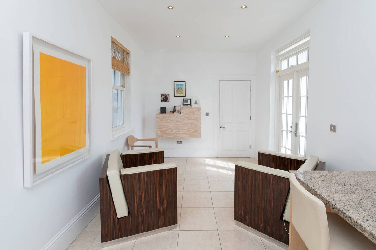 Private sitting/den/desk by kitchen/diner