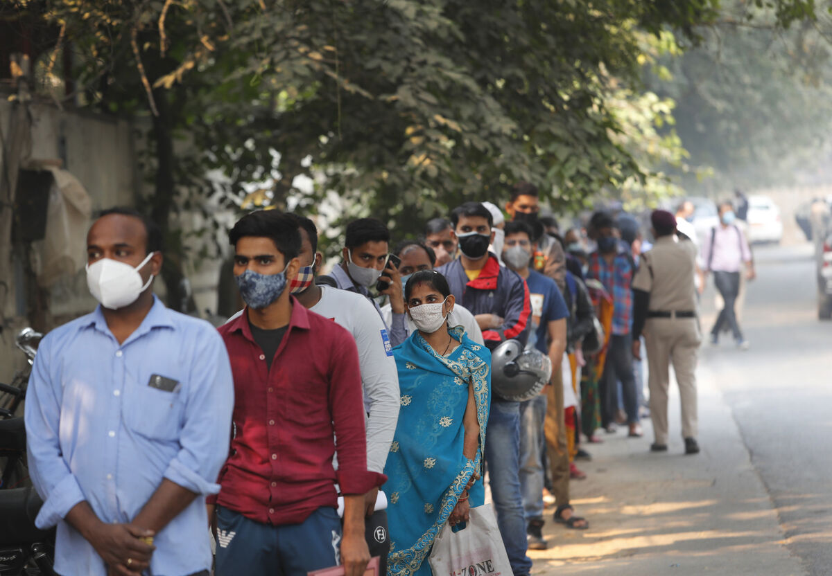 People in New Delhi queuing to get tested for Covid-19. Picture: AP Photo/Manish Swarup People in New Delhi queuing to get tested for Covid-19. Picture: AP Photo/Manish Swarup