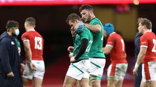 <p>Ireland's Billy Burns is consoled after the Guinness Six Nations match at Principality Stadium, Cardiff. </p>
