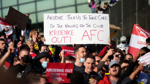 <p>Fans protest against Arsenal owner Stan Kroenke. Picture: John Walton</p>