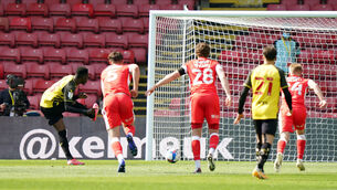 <p>Watford's Ismaila Sarr scores the only goal during the Sky Bet Championship match against Millwall at Vicarage Road. Picture: Tess Derry</p>
