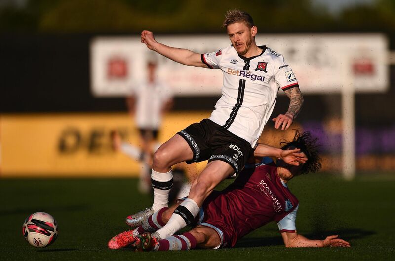 Sean Murray of Dundalk is tackled by James Brown of Drogheda United. Picture: Ben McShane/Sportsfile