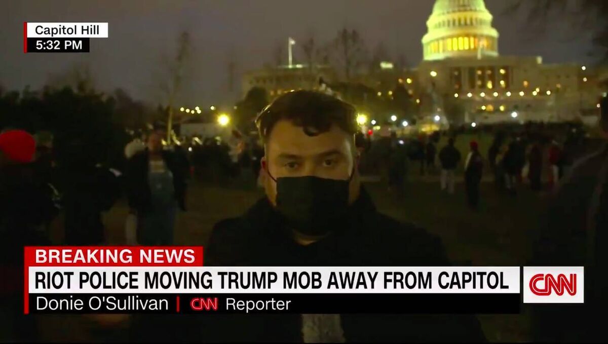 Donie O'Sullivan reporting for CNN during the US Capital building attack. Donie O'Sullivan reporting for CNN during the US Capital building attack.