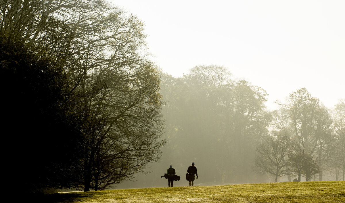 BACK ON TRACK: Golfers enjoy an early morning round of golf at Tullamore Golf Club in Co Offaly. Picture: James Crombie
                    