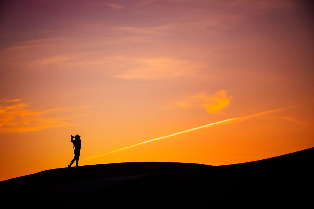  Eamonn O Donnell plays a shot in the sunrise at Dromoland Castle Golf Club, Newmarket On Fergus, Co Clare. Picture: Brian Arthur