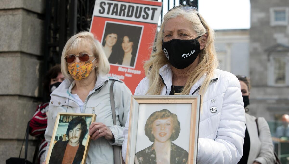  Terry Jones, left, who lost her brother Murty Kavanagh in the Stardust fire, and  Antoinette Keegan who lost two sisters, Mary and Martina, in the Stardust fire  protesting over a delay over legal aid funding outside Leinster House on Kildare Street, Dublin.