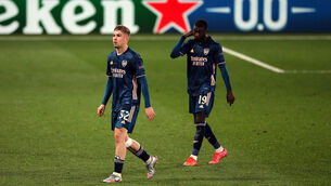 <p>Arsenal’s Emile Smith Rowe (left) and Nicolas Pepe appear dejected during the UEFA Europa League semi-final first leg</p>