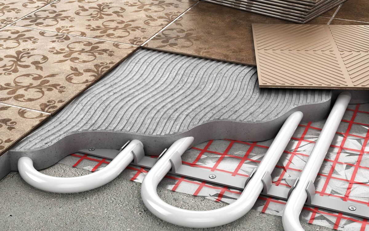 Underfloor heating is the ideal for distributing the heat from an ASHP downstairs at least. However, there are alternatives to ripping into the floor if that’s not financially viable for your situation. Picture: iStock