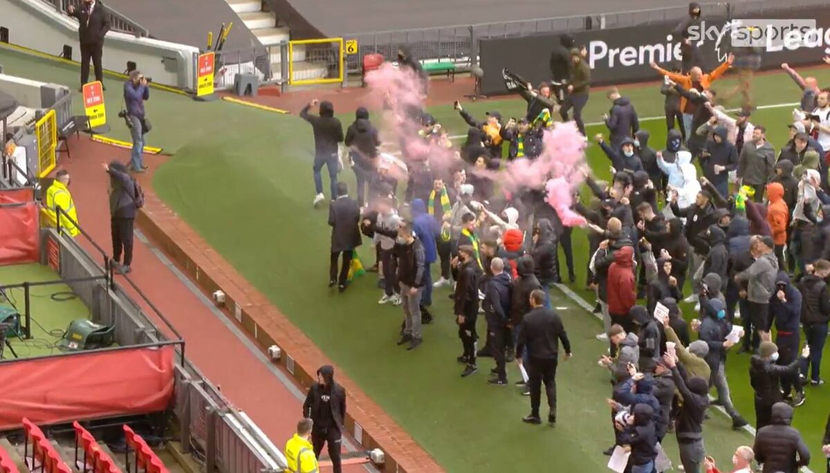 Fans protest on Old Trafford pitch. Image via Sky Sports