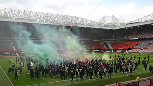 <p>Supporters protest against Manchester United's owners, inside Old Trafford. Picture: Getty Images</p>