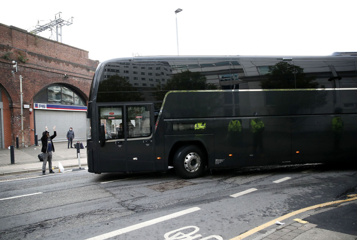The Manchester United team coach leaves The Lowry Hotel, Manchester, after their Premier League match against Liverpool is postponed. Picture: Martin Rickett