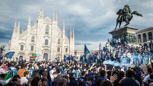 <p>MILAN IS BLUE: Inter Milan fans celebrate winning the Serie A Scudetto on Sunday.</p>