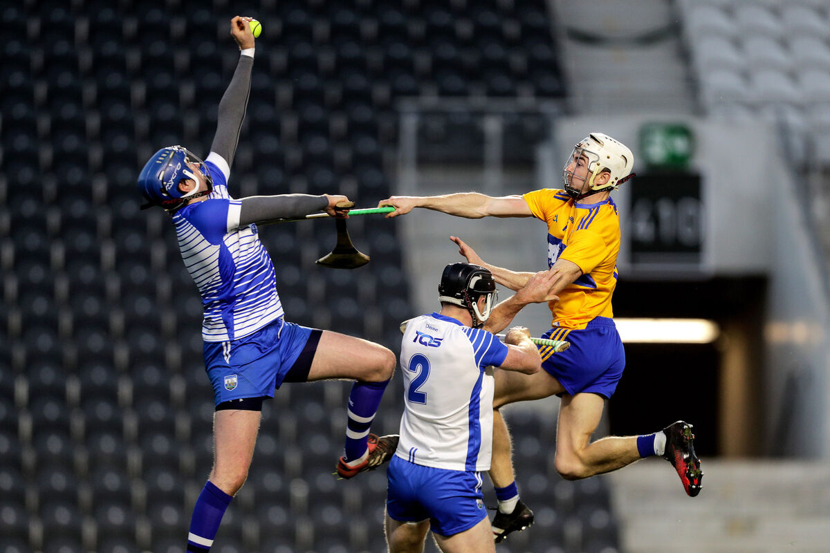 Waterford goalkeeper Stephen O'Keeffe and Ian Kenny with Ryan Taylor of Clare. Picture: INPHO/Laszlo Geczo
