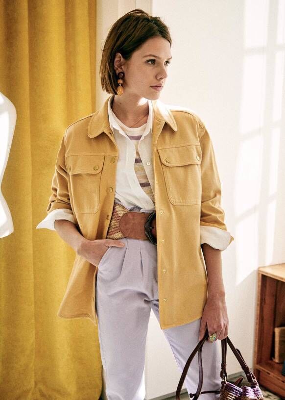 ‘Denis’ organic cotton jacket, €140; ‘Tomboy’ shirt, €85; ‘Iris’ earrings, €50; ‘Austin’ trousers, €115, Sézane