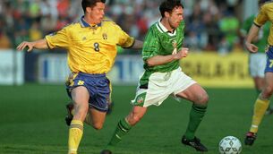 <p>Alan McLoughlin of Ireland tries to get away from Daniel Andersson of Sweden. Picture: Billy Stickland</p>