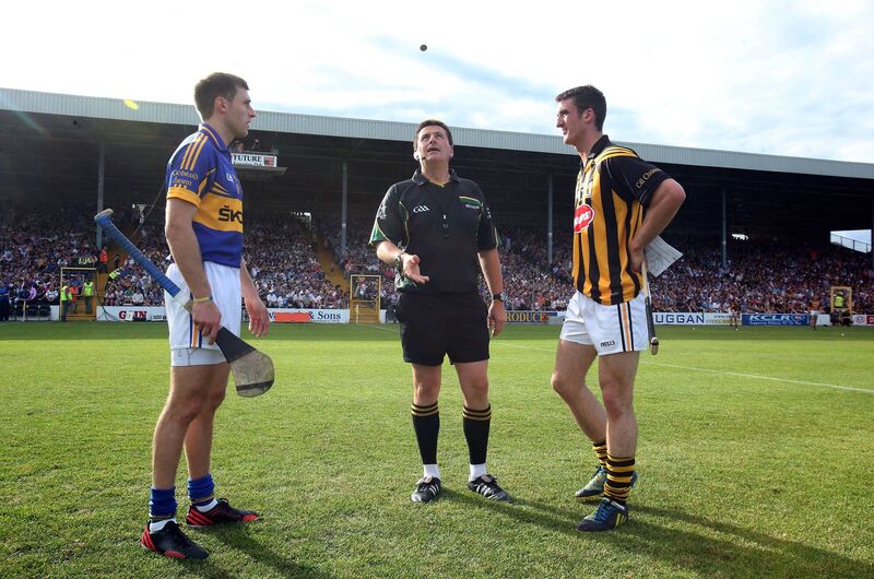 Kilkenny captain Colin Fennelly and Shane McGrath of Tipperary with referee Brian Gavin at Nowlan Park. Picture: INPHO/Donall Farmer Kilkenny captain Colin Fennelly and Shane McGrath of Tipperary with referee Brian Gavin at Nowlan Park. Picture: INPHO/Donall Farmer