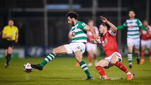 <p>Roberto Lopes of Shamrock Rovers in action against Ronan Coughlan of St Patrick's Athletic during last season's meeting between the sides. This term, the pair are the top two in the country - the first time this has been the case for 60 years.</p>