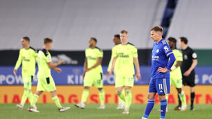 <p>Leicester City's Marc Albrighton looks dejected after Newcastle United's Callum Wilson (third left) celebrates scoring their side's third goal of the game. Picture: PA</p>