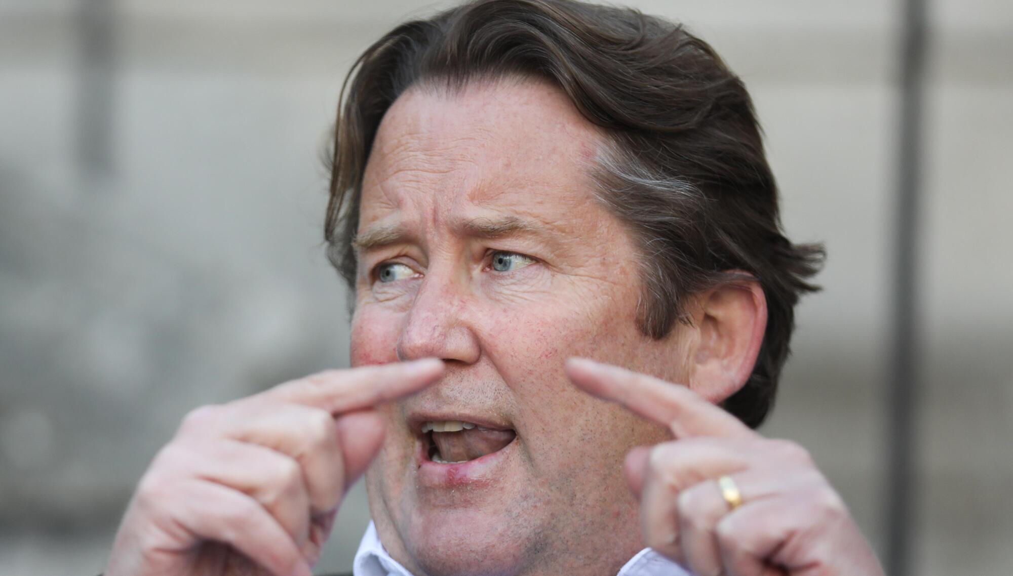 The Minister for Housing says that he lost over 50% of his investment in a foreign real estate trust over 10 years ago and has not invested since.