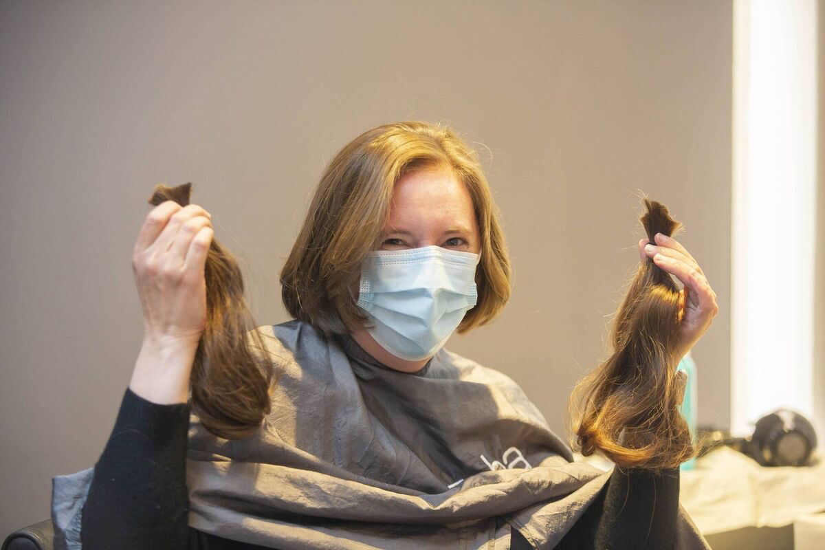 Mary Crispie from Cork getting her hair cut for the first time in months while raising fund for the Rapunzel charity in Zeba, Dublin, on Monday. Picture: Gary Ashe Mary Crispie from Cork getting her hair cut for the first time in months while raising fund for the Rapunzel charity in Zeba, Dublin, on Monday. Picture: Gary Ashe