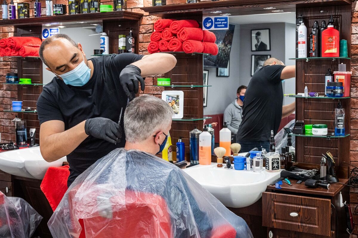 Golden Scissors Barber shop in Bandon was busy from early morning. Picture: Andy Gibson. Golden Scissors Barber shop in Bandon was busy from early morning. Picture: Andy Gibson.