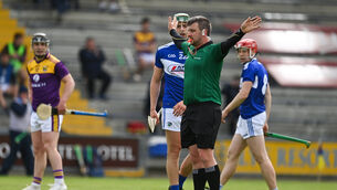 <p>MAKING THE CALL: Referee Thomas Walsh signals for a penalty after Wexford’s Rory O’Connor was fouled by Laois defender Lee Cleere in Sunday’s Allianz HL Division 1 Group B match at Chadwicks Wexford Park. Cleere was sin-binned for his troubles. <span class="contextmenu emphasis CaptionCredit">Picture: Brendan Moran/Sportsfile</span>
            </p>