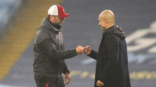 <p>Jurgen Klopp (left) called Pep Guardiola the best manager in the world as he congratulated City on their title (Martin Rickett/PA)</p>