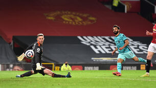 <p>Liverpool's Mohamed Salah scores their fourth goal of the game</p>