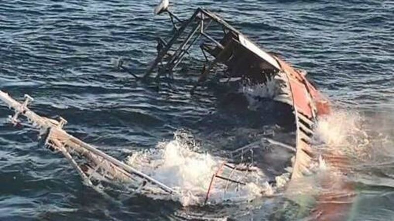 Four rescued as burning trawler sinks off Cork coast Four rescued as burning trawler sinks off Cork coast